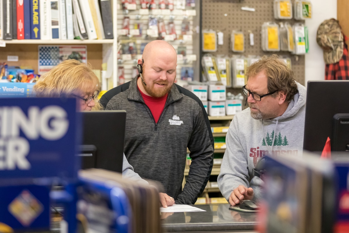 Simonson Lumber employees talking in their store