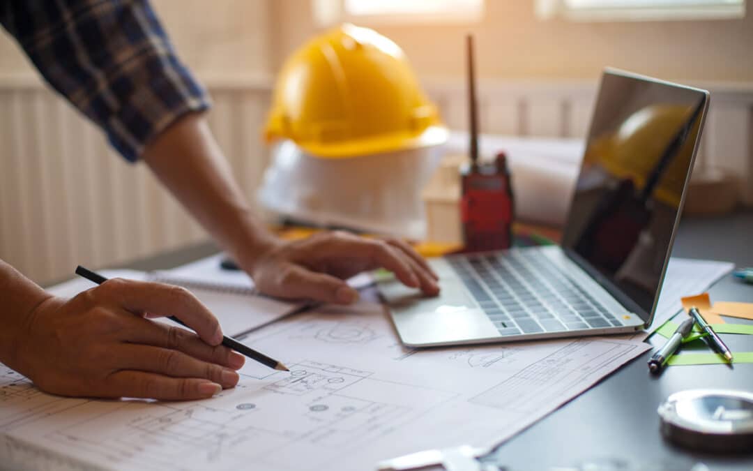 Man Going Over Construction Site Plans